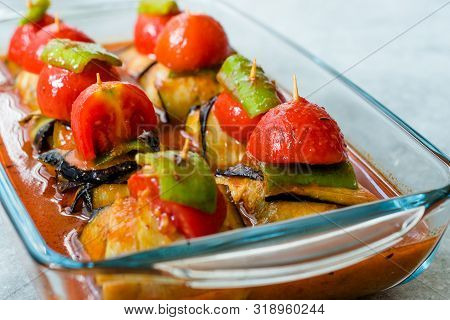 Turkish Islim Kofta Kebab With Meatballs And Cherry Tomatoes Wrapped In Eggplant / Aubergine Slices.