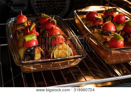 Turkish Islim Kofta Kebab With Meatballs And Cherry Tomatoes Wrapped In Eggplant / Aubergine Slices