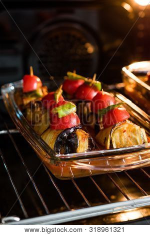 Turkish Islim Kofta Kebab With Meatballs And Cherry Tomatoes Wrapped In Eggplant / Aubergine Slices