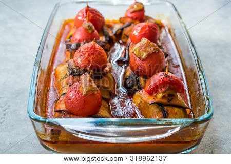 Turkish Islim Kofta Kebab With Meatballs And Cherry Tomatoes Wrapped In Eggplant / Aubergine Slices.