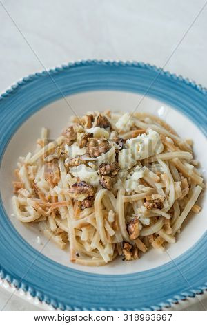 Turkish Homemade Food Noodle / Eriste With Cheese And Walnuts.