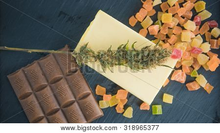 Preparing To Cooking Cake With Cannabis Butter. Concept Of Using Marijuana In Food Industry.