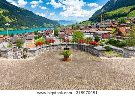 Scenic View Of A Traditional Medieval Alpine Village On A Sunny Day. Lungern Switzerland.