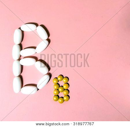 Vitamin B 8 Is Laid Out In Tablets. Photo Top View.