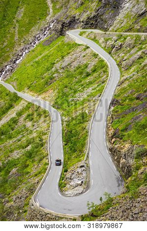 Trolls Path Trollstigen Winding Scenic Mountain Road With Cars, Norway Europe. National Tourist Rout