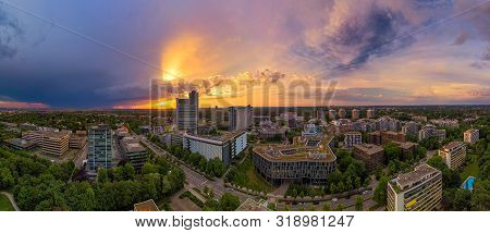 Munich From Above, A Panoramic Droneshot In The Colorful Evening At Sunset.