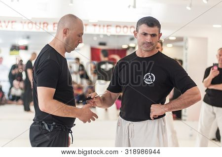 Kapap Instructor Altin Qoku, Demonstrates Disarm Techniques Against Knife Attack