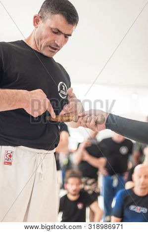 Kapap Instructor Altin Qoku, Demonstrates Disarm Techniques Against Knife Attack