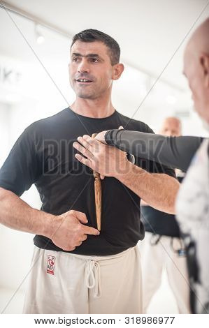 Kapap Instructor Altin Qoku, Demonstrates Disarm Techniques Against Knife Attack