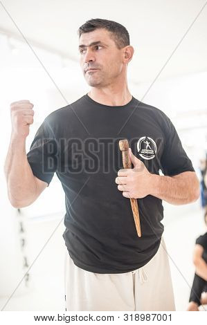 Kapap Instructor Altin Qoku, Demonstrates Disarm Techniques Against Knife Attack