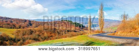Sunny Morning In Mountainous Countryside. Panorama Of Ukrainian Carpathian Rural Area In November. L