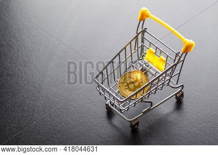 Golden Bitcoin Lies On The Banknotes.new Virtual Money. Crypto Currency Top View. Real Coins Of Bitc