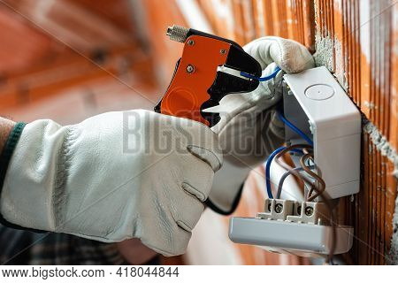 Electrician At Work On A Residential Electrical System. Electricity.