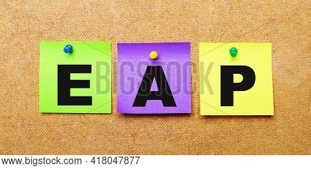 On A Beige Background, Multi-colored Stickers For Notes With The Word Eap Employee Assistance Progra