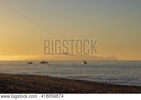 Beautiful Black Beach With Coast And Sea In Vlichada With Blue Sky Background With White Clouds And 