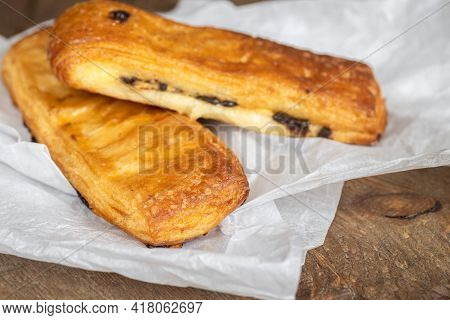 French Pastries, Tasty Chocolate Puff Bakery On White Paper, Selective Focus