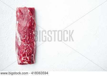 Fresh And Raw Beef Meat. Whole Piece Of Tenderloin With Steaks Set, On White Stone  Background, Top 
