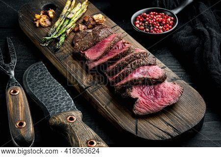 Slices Of Medium Rare Grilled Marbled Meat Beef Steak Set, Tenderloin Or Fillet Mignon Cut, On Woode