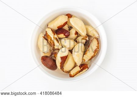 Process Of Soaking Various Nuts: Brazilian Nut In Water To Activate. Home Cooking: Making Plant Base
