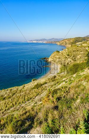 Spanish Coastline In Andalucia. Cliffs Of Maro Cerro Gordo Natural Park, Near Maro And Nerja, Malaga