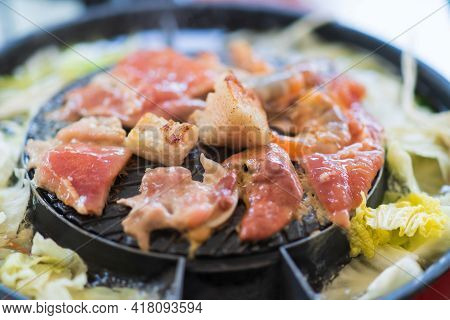 Close Up Of Thai Barbecue Buffet Pork Meat And Seafood On The Hot Pan, Moo Ka Ta