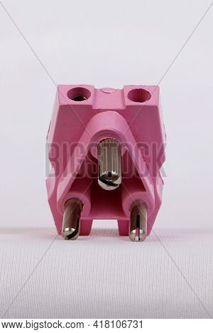 A Three Pin Socket Made Of Plastic