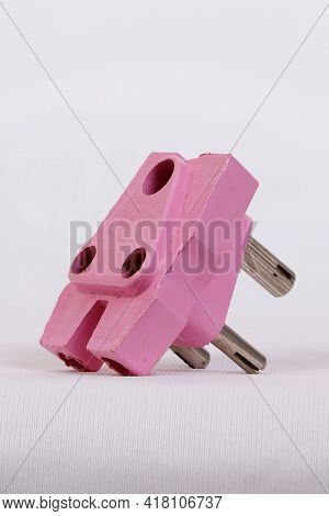 A Three Pin Socket Made Of Plastic