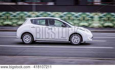 Moscow, Russia - April 2021: Nissan Leaf Electric Vehicle With Zero Emission Drives Fast Through The