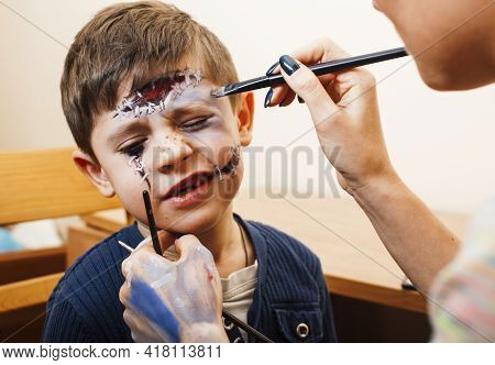 Little Cute Child Making Facepaint On Birthday Party, Zombie Apocalypse Facepainting, Halloween Prep
