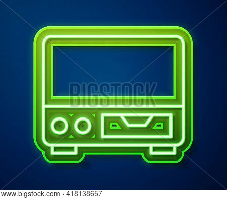 Glowing Neon Line Old Video Cassette Player Icon Isolated On Blue Background. Old Beautiful Retro Hi