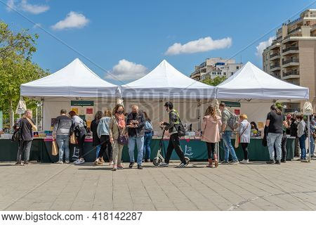 Palma De Mallorca; April 23 2021: Festivity Of Sant Jordi Or Book Day In The Historic Center Of Palm