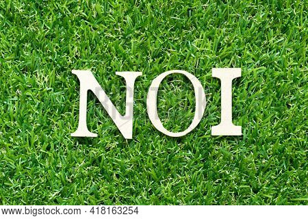 Alphabet Letter In Word Noi (abbreviation Of Net Operating Income Or Not Otherwise Indexed) On Green