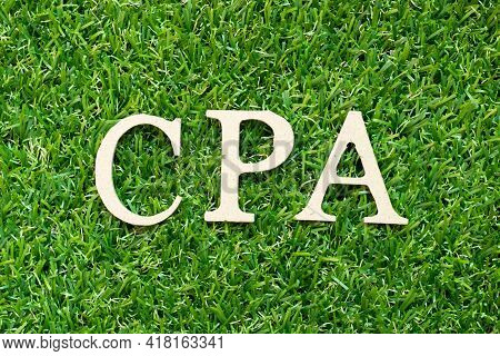 Alphabet Letter In Word Cpa (abbreviation Of Cost Per Click Or Certified Public Accountant) On Green