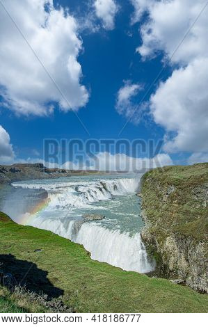 Iceland, Gullfoss Waterfall. Captivating Scene With Rainbow Of Gullfoss Waterfall