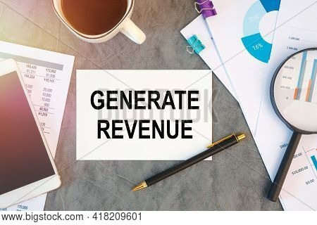 Generate Revenue Is Written In A Document On The Office Desk With Office Accessories, Coffee, Diagra