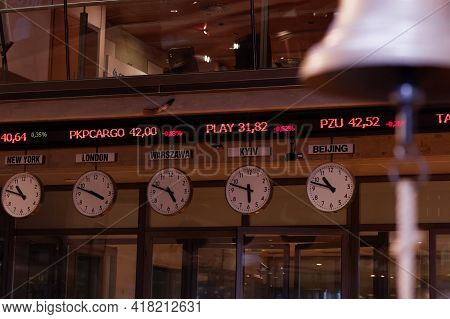 Warsaw/poland - March 27, 2018: View On Digital Quotes, Clocks And Bell In Warsaw Stock Exchange (ws