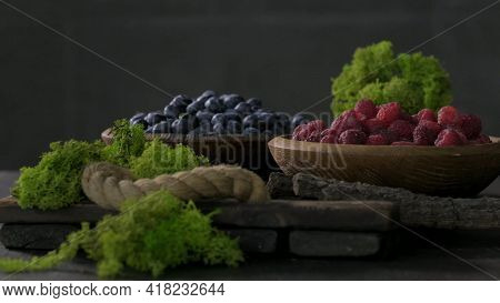 Group Of Ripe Juicy Organic Berries On The Blue Rustic Table. Delicious Nature Vegetarian Ingredient