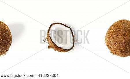 Tropical Summer Coconut Background. Half And Whole Coconuts Yellow And White Background