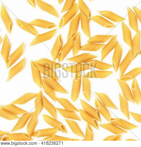 Penne Rigate Pasta. Pasta On White Background. Dry Penne Rigate Pasta Isolated Over White. Top View.