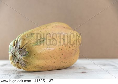 Formosa Variety Papaya Fruit On Wooden Background
