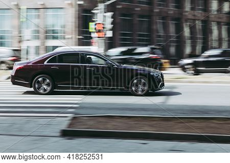 Moscow , Russia - March 2021: Fast Moving Mercedes-benz Cls-class Sedan C257 Rides On City Road. Sid