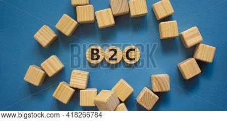 B2c, Business To Customer Symbol. Wooden Circles With Word 'b2c, Business To Customer'. Wooden Cubes