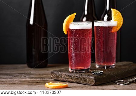 Grapefruit Or Cherry Radler, Citrus Beer Cocktail. Refreshing Fruit Beer Drink On Black Table, Copy 