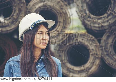 Woman Construction Engineer Wear Safety White Hard Hat At Construction Site Industry Worker. Female