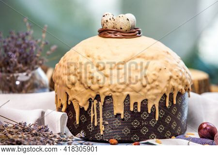 Panettone Is The Traditional Italian Dessert For Easter In 2021. Homemade Panettone Covered In Choco
