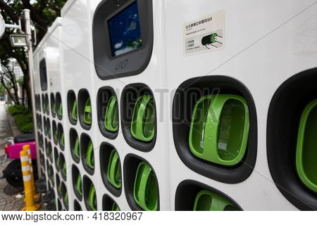 Taipei city, Taiwan - June 14th, 2020: charging station for battery packs of Taiwan-based Gogoro electronic motocycle at street in Taipei, Taiwan, Asia