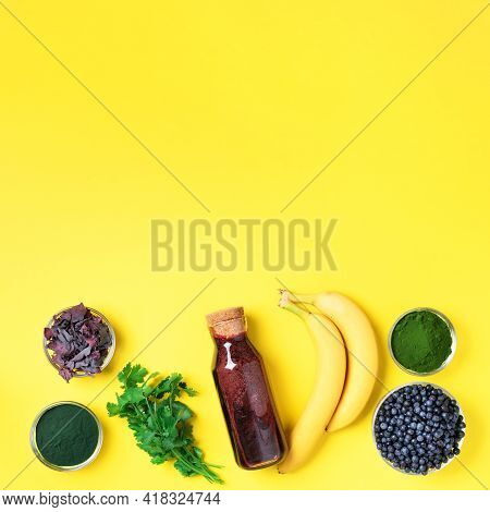 Banner Of Ingredients For Heavy Metals Detox Smoothie. Bilberry, Barley Grass, Spirulina, Orange Jui