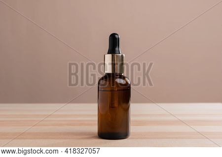 Eco Mineral Oil In Amber Glass Bottles With Pipette. Transparent Hyaluronic Serum Gel And Skin Care