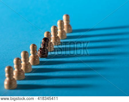 Chess Pieces In A Row, White Pawns On A Blue Background,