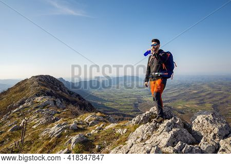 Traveling Outdoor Hiking In Nature. Traveling In Nature. Man Hiker Outdoor In Nature. Nature. Hiker.